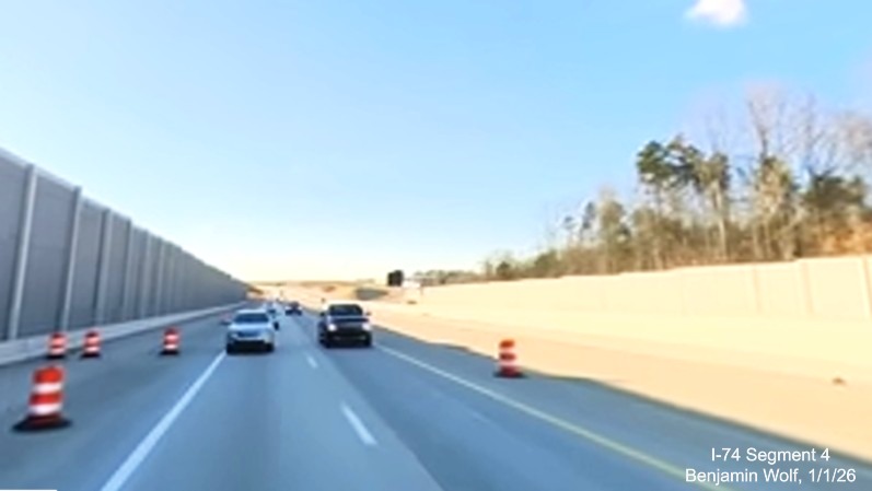 Image of covered over overhead sign for Union Cross Road exit on I-40 East in the 
	  Winston-Salem Northern Beltway interchange project work zone, screen grab from Benjamin Wolf video, January 2026