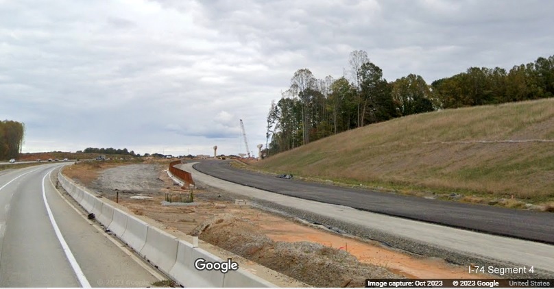 Image of paved future ramp to I-74 West/Winston-Salem Northern Beltway from I-40 East 
        in Forsyth County, Google Maps Street View, October 2023