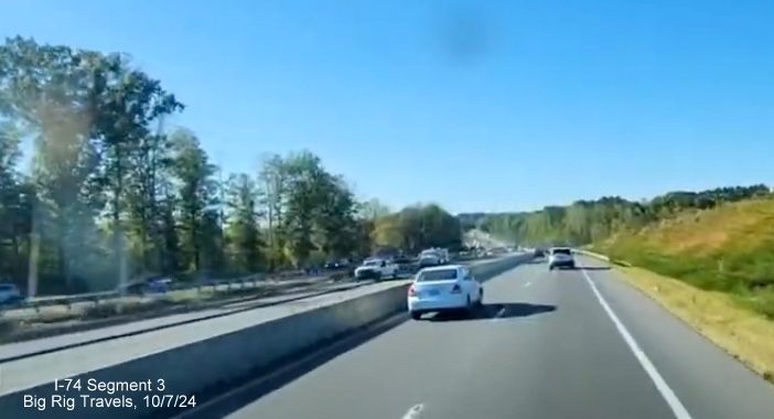 Image of traffic on US 52 North (Future I-74 West) using temporary lanes between NC 65 and 
       the Westinghouse Road exit, Big Rig Travels, October 2024