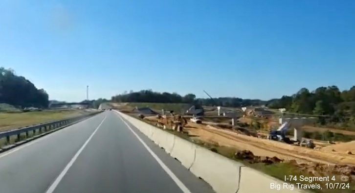 Image of support structure being built for future Winston-Salem Beltway interchange ramps seen from
        I-74 West, screen grab of Big Rig Travels video, October 2024