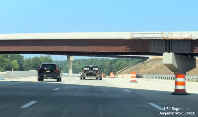Image of nearly completed flyover ramps for the I-74/Beltway exit on I-40 West 
	 in the Winston-Salem Northern Beltway workzone, screen grab from Benjamin Wolf video, July 4, 2026