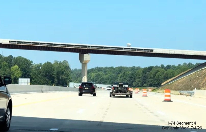 Image of nearly completed flyover ramps for the I-74/Beltway exit on I-40 West 
	 in the Winston-Salem Northern Beltway workzone, screen grab from Benjamin Wolf video, July 4, 2026