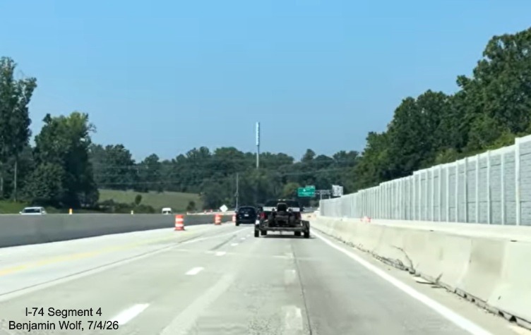 Image of concrete barriers still installed along new I-40 West lanes after the
	 Beltway interchange, screen grab from Benjamin Wolf video, July 4, 2026