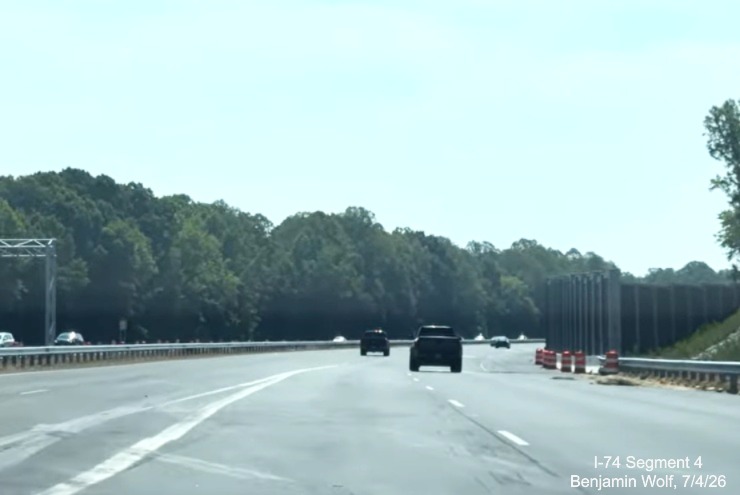 Image of NC 192 East lanes approaching the merge with those from future I-74 West. 
	 Notice the lane markings have been placed for the Beltway lanes, screen grab from Benjamin Wolf video, July 4, 2026