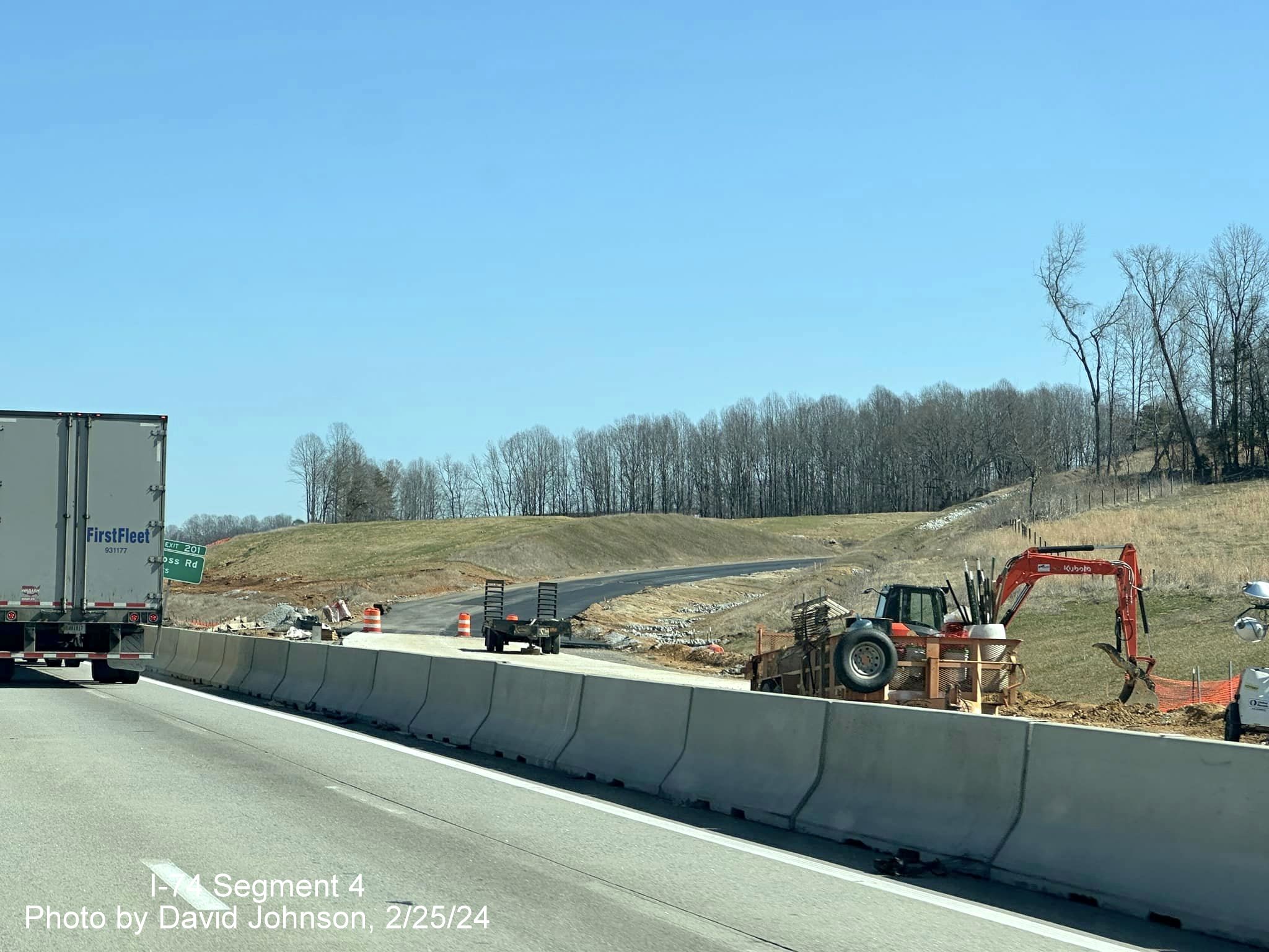 Image of work proceeding on future exit ramp to I-74/Winston-Salem Northern Beltway East from 
        I-40 East in Forsyth County, by David Johnson, February 2024