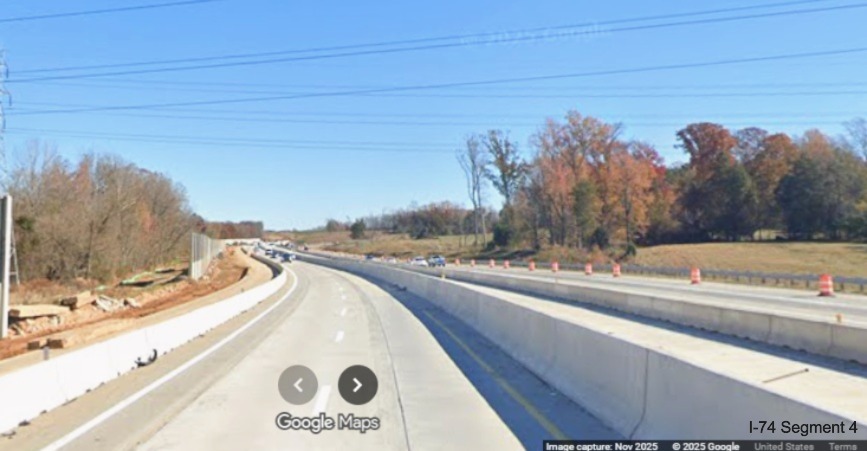 Image looking back along future I-40 West lanes at sections of noise
	  wall under construction in I-74 Winston-Salem Northern Beltway interchange construction zone, Google Maps Street View, 
	  November 2025