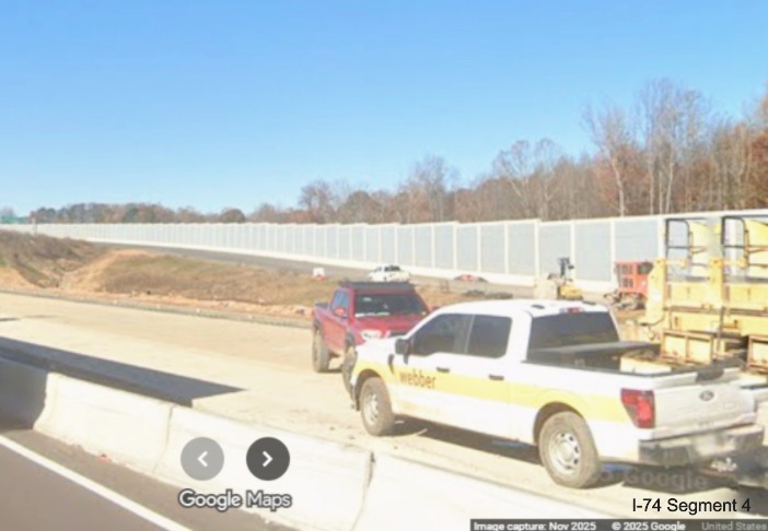 Image of Future I-74 exit ramp and right side noise walal from I-40 West lanes,
	  Google Maps Street View, November 2025