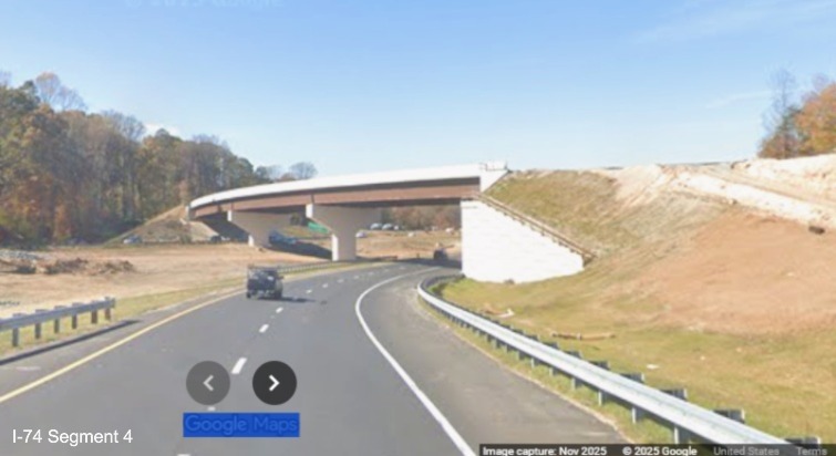 Image of current I-74 West traffic using future ramp to NC 192 West approaching 
	  flyover bridge for future NC 192 East to I-74 West Winston-Salem Northern Beltway, Google Maps Street View, November 2025