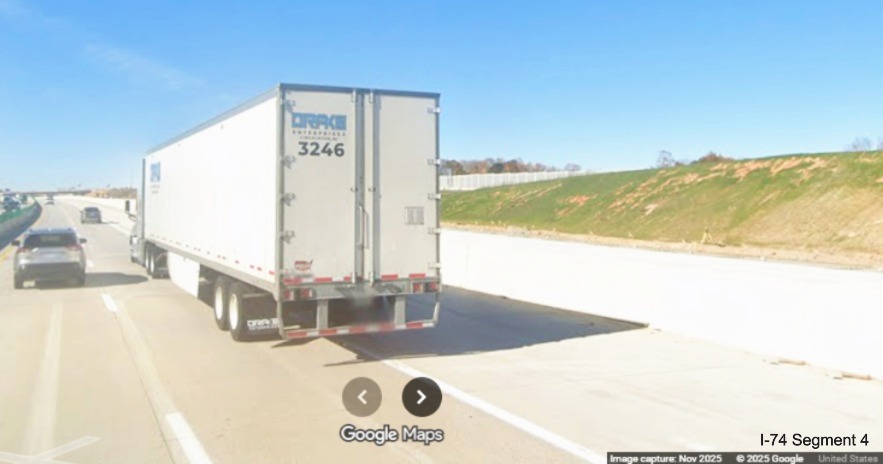 Image of Future I-74 exit ramp and graded future I-40 West lanes from current
	  lanes approaching set of flyover ramps, Google Maps Street View, November 2025
