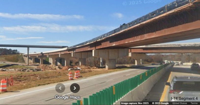 Image of Future I-40 West to I-74 East flyover ramp under construction from 
	  current I-40 West lanes, Google Maps Street View, November 2025
