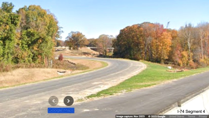 Image of view west along current I-74 West lanes looking back at future ramp to 
	  NC 192 West from I-74 East/Winston-Salem Northern Beltway, Google Maps Street View, November 2025