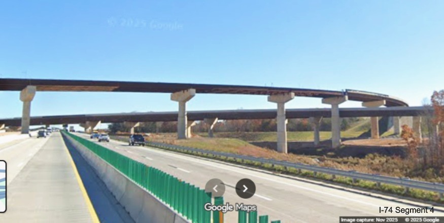 Image of Future I-40 East lanes passing under I-74 Winston-Salem Northern 
	  Beltway interchange flyover ramps under construction, Google Maps Street View, November 2025