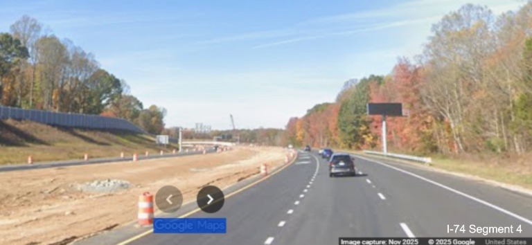 Image of median work continuing as seen from I-74 West in work zone for 
	  Winston-Salem Northern Beltway interchange after the Union Cross Road exit, Google Maps Street View, November 2025