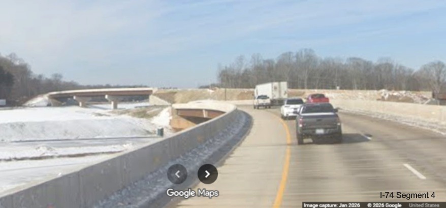 Image from current I-74 West of future I-74 Beltway lanes covered with snow
	  in the Winston- Salem Northern Beltway interchange project work zone, screen grab from Google Maps Street View, January 2026