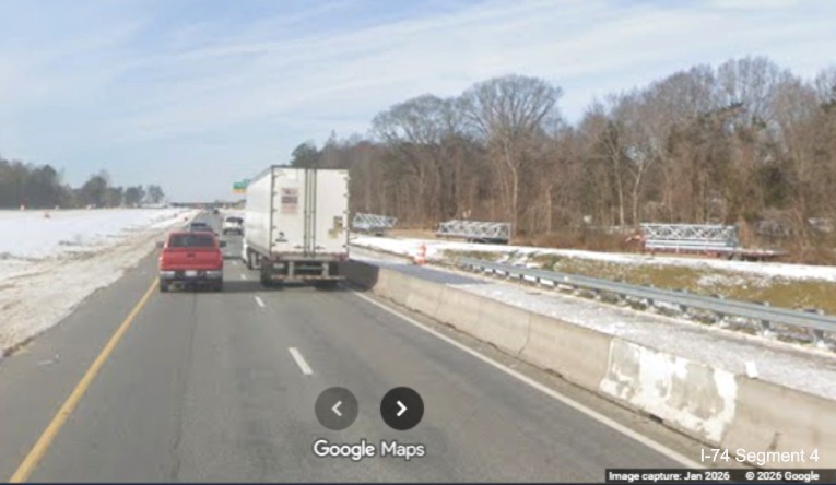Image of overhead sign posts and supports along current I-74 West prior to the  
	  Ridgewood Road exit as part of the Winston- Salem Northern Beltway interchange project, screen grab from Google Maps Street 
	  View, January 2026
