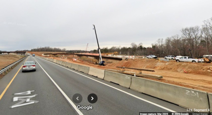 Image of grading the future I-74 West lanes to travel under the NC 192 ramp at
	  the Winston-Salem Northern Beltway interchange on I-74 West, Google Maps Street View, March 2025
