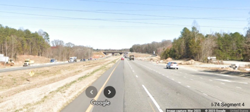 Image of approaching the future on-ramp to the western lanes of the
	  Winston-Salem Northern Beltway in the work zone on I-74 East, Google Maps Street View, March 2025