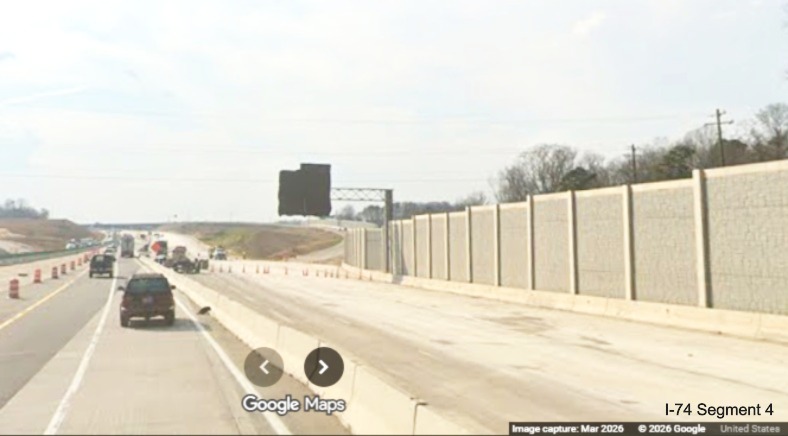 Image of I-40 West traffic still using I-40 East lanes passing the future I-74
	 exit ramp in the Winston-Salem Northern Beltway interchange project work zone, screen grab from Google Maps Street View, 
	 March 2026