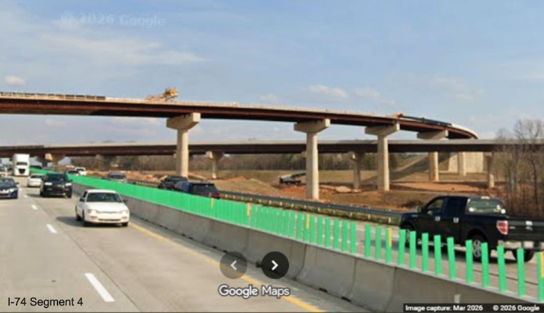 Image of I-40 West traffic still using I-40 East lanes going under the I-74 Beltway 
	 flyover ramps in the Winston-Salem Northern Beltway interchange work zone, screen grab from Google Maps Street View, March 
	 2026