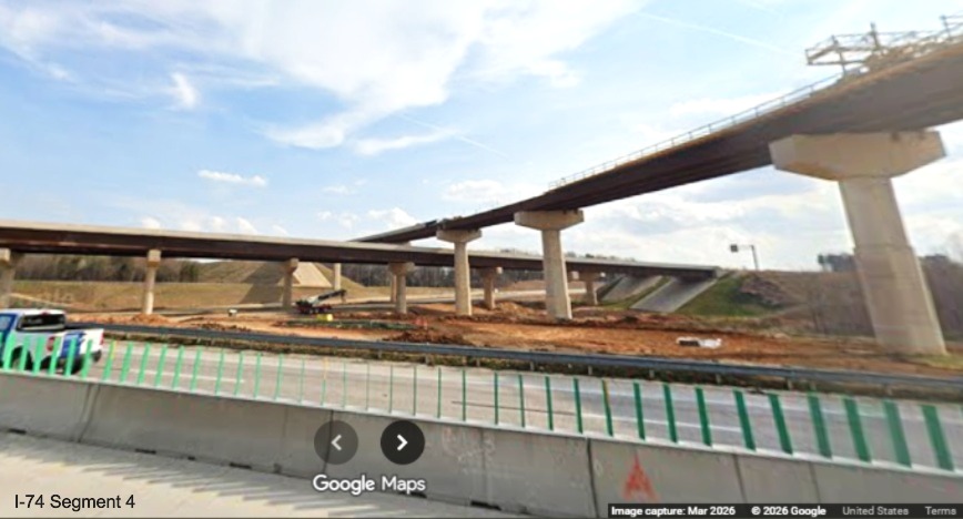 Image looking I-40 East lanes at two sets of flyover ramps for the I-74 Beltway 
	 in the Winston-Salem Northern Beltway interchange work zone, screen grab from Google Maps Street View, March 2026