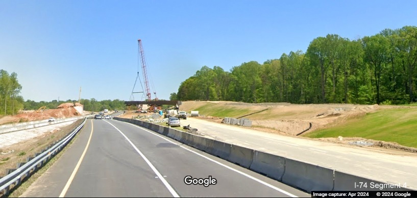 Image of the lane shift at future exit ramp to I-74 West/Winston-Salem Northern Beltway on I-74 East, Google 
        Maps Street View, April 2024