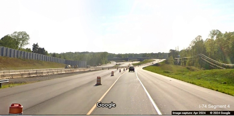 Image of West NC 74 (Future I-74) beyond University Parkway bridge, Google Maps Street View, 
        April 2024