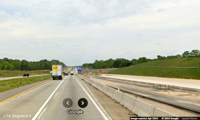 Image of partially completed concrete lanes on future I-40 East approaching ramp from future I-74/Winston-Salem
        Northern Beltway west in Forsyth County, Google Maps Street View, April 2024