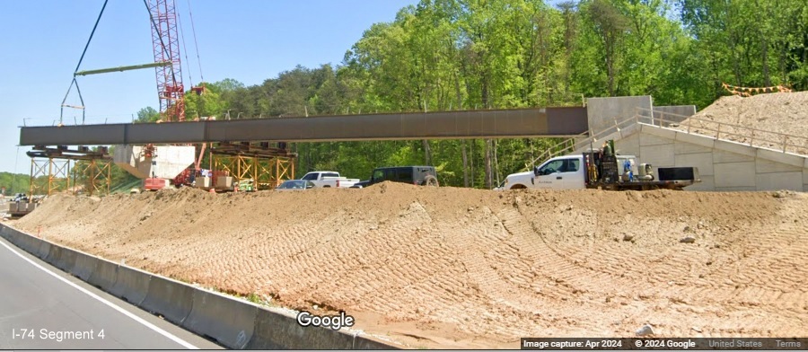 Image of future ramp flyover bridge for I-74 West/Winston-Salem Northern Beltway interchange
        on I-74 East, Google Maps Street View, April 2024