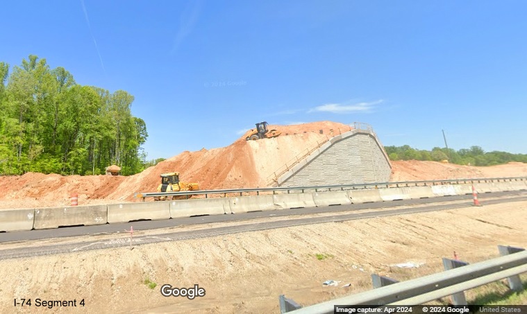 Image of abutment construction along current I-74 West lanes for the future Winston-Salem 
        Northern Beltway ramp, Google Maps Street View, April 2024