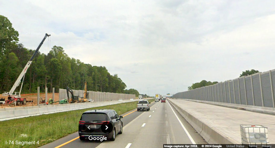 Image of new noise wall being built along I-40 West after the future I-74/Winston-Salem Northern 
        Beltway interchange in Forsyth County, Google Maps Street View, April 2024