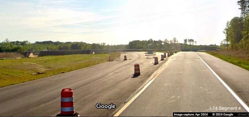 Image of future US 52 South/Future I-274 Beltway ramp from temporary NC 74 West lanes,
        Google Maps Street View, April 2024