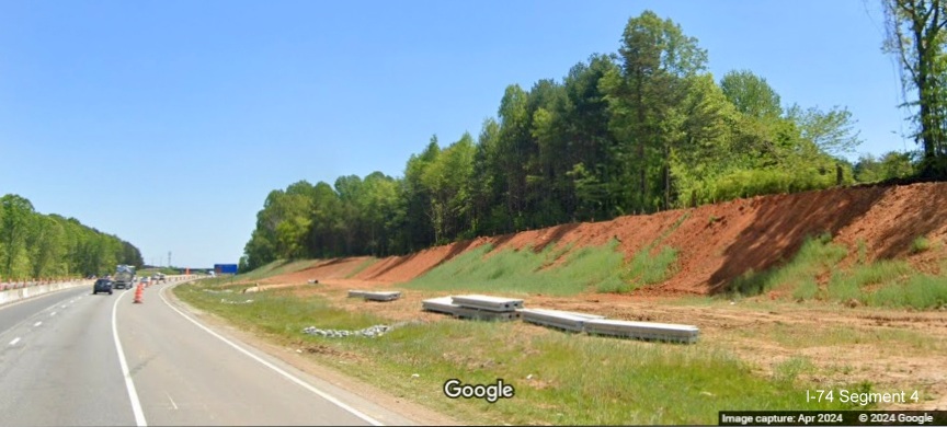 Image of construction along I-74 East nearing eastern end of the Winston-Salem Northern Beltway 
        interchange work zone, Google Maps Street View, April 2024