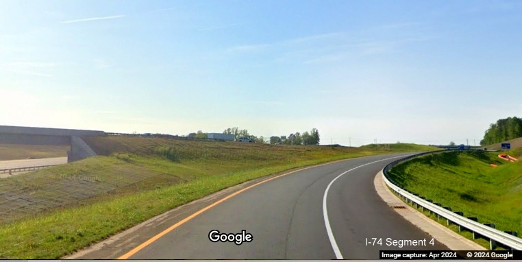 Image of current NC 74 West ramp approaching US 52 North still under construction as part of Beltway
        interchange project construction, Google Maps Street View, April 2024