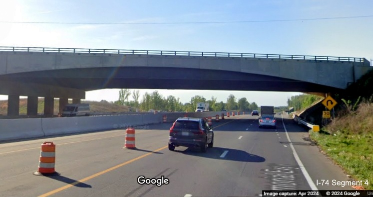 Image of US 52 North heading under the NC 65 bridge with exit on other side,
        Google Maps Street View, April 2024