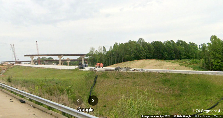 Image of new steel supports being placed for future I-74/Winston-Salem Northern Beltway 
        interchange flyover ramps from I-40 East in Forsyth County, Google Maps Street View, April 2024