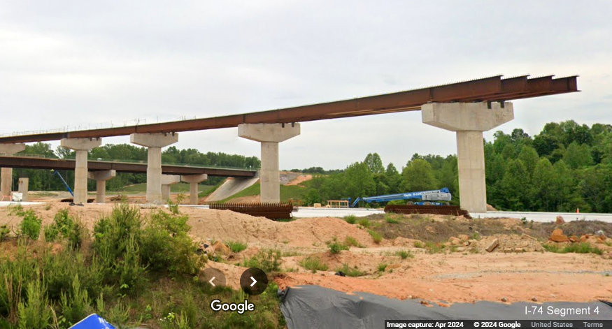 Image of one of the future flyover ramps for the I-74/Winston-Salem Northern Beltway 
        interchange as seen from current I-40 East in Forsyth County, Google Maps Street View, April 2024