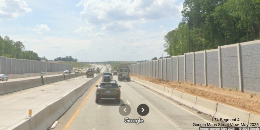 Image of median barrier work continuing approaching the Winston-Salem Northern 
	  Beltway interchange on I-40 West, Google Maps Street View, May 2025