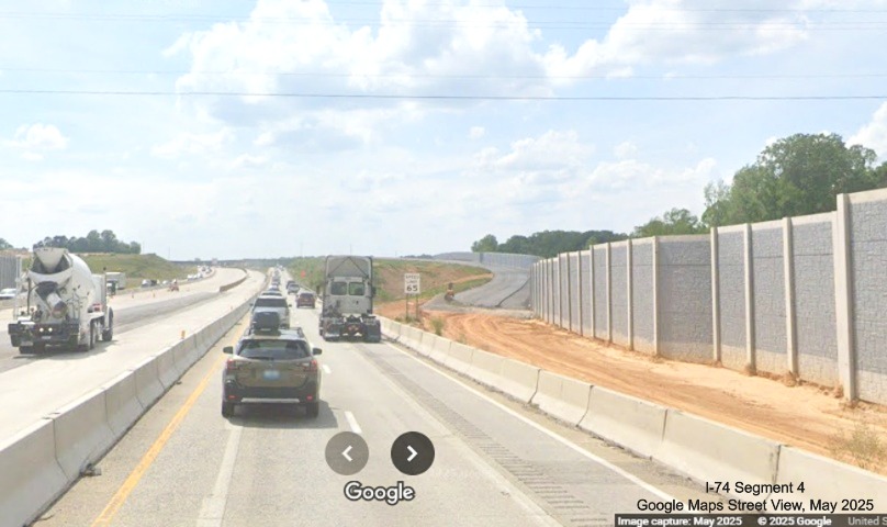 Image of start of future off-ramp for I-74 East/Winston-Salem Northern Beltway 
	  that is graded and partially paved on I-40 West, Google Maps Street View, May 2025