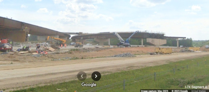 Image of flyover ramps under construction for the I-74/Winston-Salem Northern 
	  Beltway interchange with I-40, Google Maps Street View, May 2025