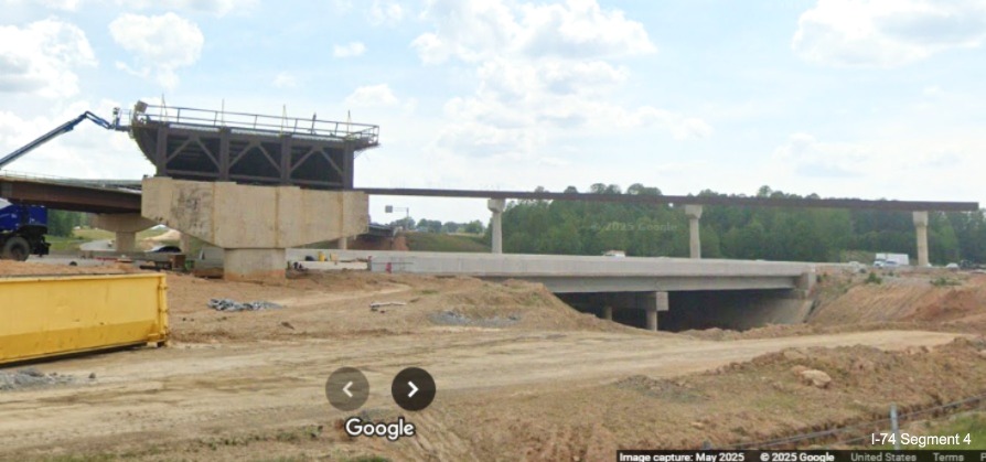 Image of future I-40 West bridge over the I-74/Winston-Salem Northern 
	  Beltway lanes from the current westbound lanes, Google Maps Street View, May 2025
