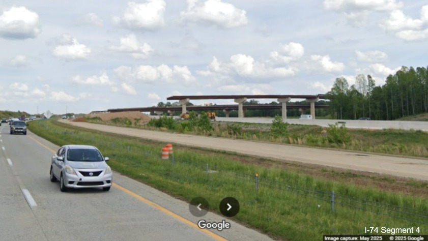 Image of looking back at the future flyover ramps for the I-74/Winston-Salem 
	  Northern Beltway interchange from I-40 West, Google Maps Street View, May 2025