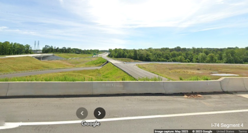 Image of completed Winston-Salem Northern Beltway exit ramps looking east from
	  US 52 North, Google Maps Street View, May 2025