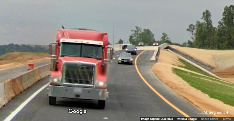 Image of new US 52 North roadway crossing bridge over future I-74 East lanes as part of the 
        future Winston-Salem Northern Beltway interchange construction project, Google Maps Street View, June 2023