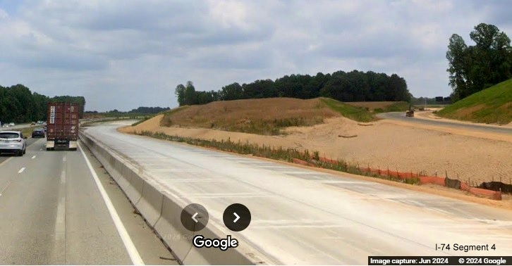 Image of view along future off-ramp from I-40 East prior to future I-74/Winston-Salem 
        Northern Beltway, Google Maps Street View, June 2024