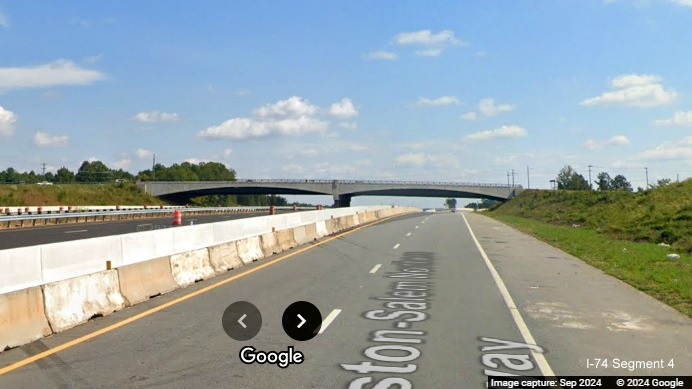 Image of US 52 South lanes approaching NC 65 bridge in 
      Winston-Salem Northern Beltway construction zone, Google Maps Street View, September 2024