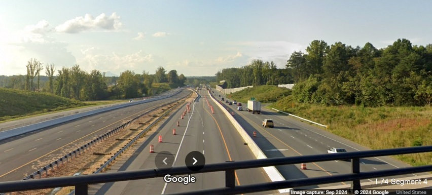 Image of NC 52 traffic from the NC 65 bridge looking north in 
      Winston-Salem Northern Beltway construction zone, Google Maps Street View, September 2024