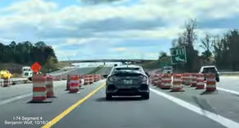 Image of the new alignment at the start of NC 74 (Future I-74) Winston-Salem Beltway 
        at the US 52 interchange, screen grab from Benjamin Wolf video, October 2024