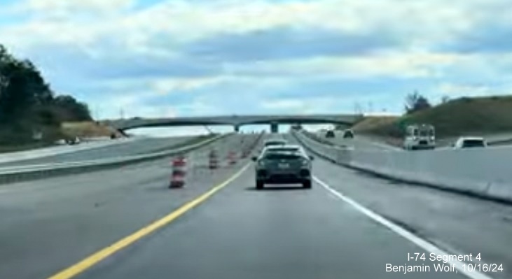 Image of the only 1 lane open along new alignment for NC 74 (Future I-74) Winston-Salem Beltway 
        after the US 52 interchange, screen grab from Benjamin Wolf video, October 2024