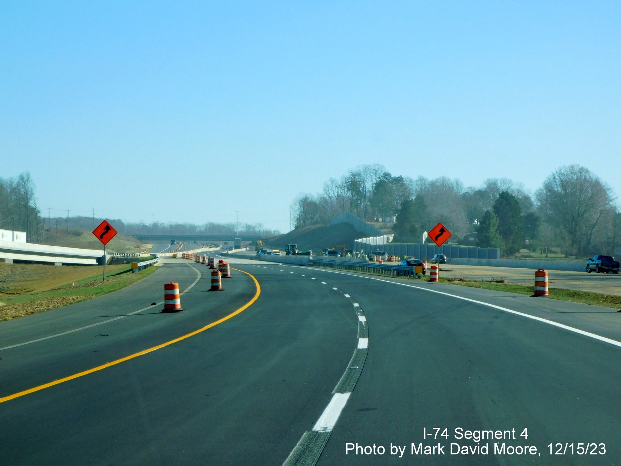 Image of of NC 74 (Future I-74) East using westbound lanes approaching Grassy Creek bridges near  
        NC 66 exit, by Mark David Moore, December 2023