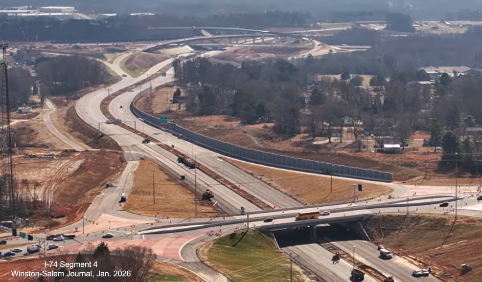 Image over Beltway flyover ramps under construction at Kernersville Road as part
of the I-74 Winston-Salem Northern Beltway interchange project, screen grab from Winston-Salem Journal video, January 2026